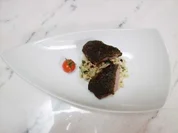 Lamm in Kräuter-Oliven-Kruste an Spinatrisotto - Rezept