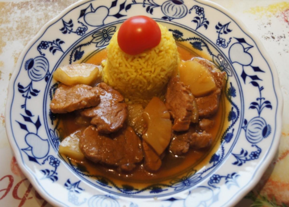 Bilder für Schweinefilet-Ananas-Wok mit Curry-Basmatireis - Rezept