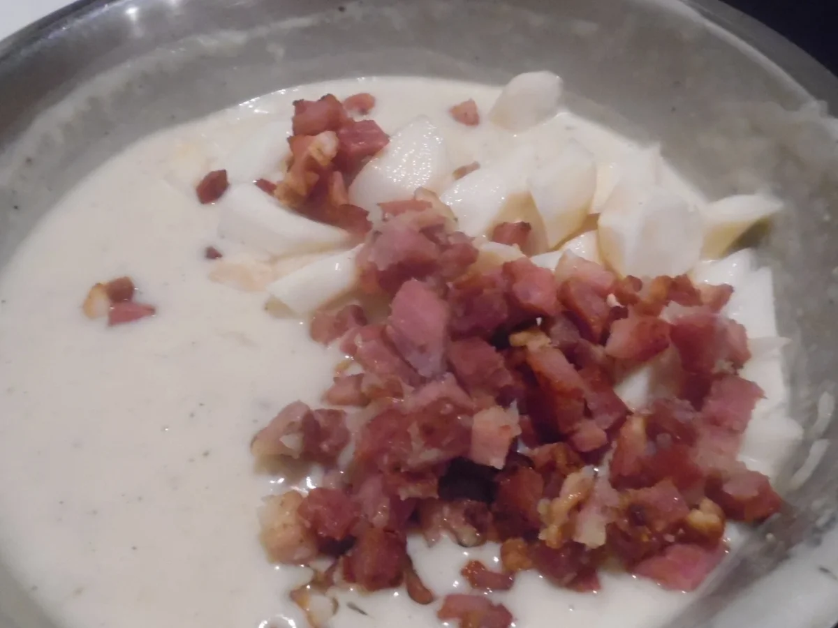 Rezept: Ofen-Dorade mit Knoblauch-Kartoffeln und Rahm-Schwarzwurzeln Bild Nr. 3 Ofen-Dorade mit Knoblauch-Kartoffeln und Rahm-Schwarzwurzeln - Rezept - Bild Nr. 3