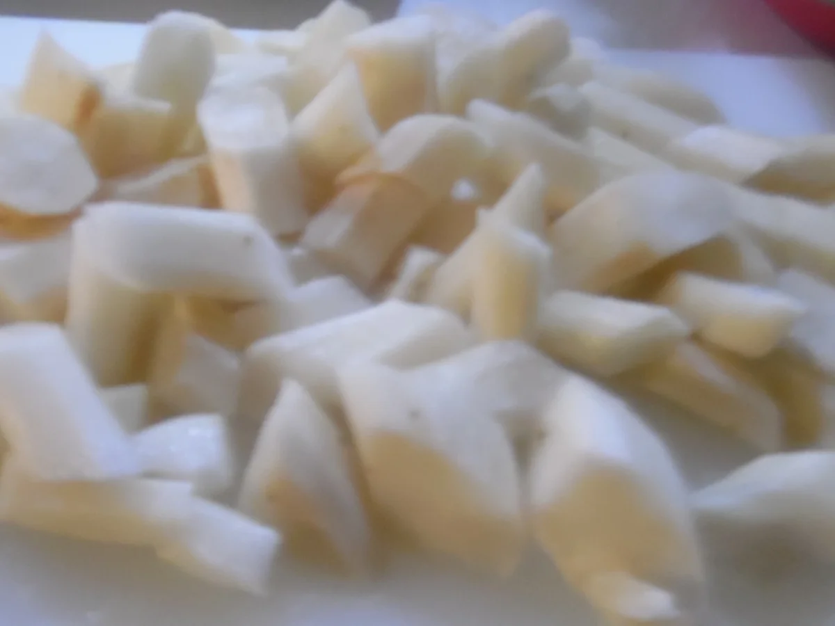 Rezept: Ofen-Dorade mit Knoblauch-Kartoffeln und Rahm-Schwarzwurzeln Bild Nr. 4 Ofen-Dorade mit Knoblauch-Kartoffeln und Rahm-Schwarzwurzeln - Rezept - Bild Nr. 4