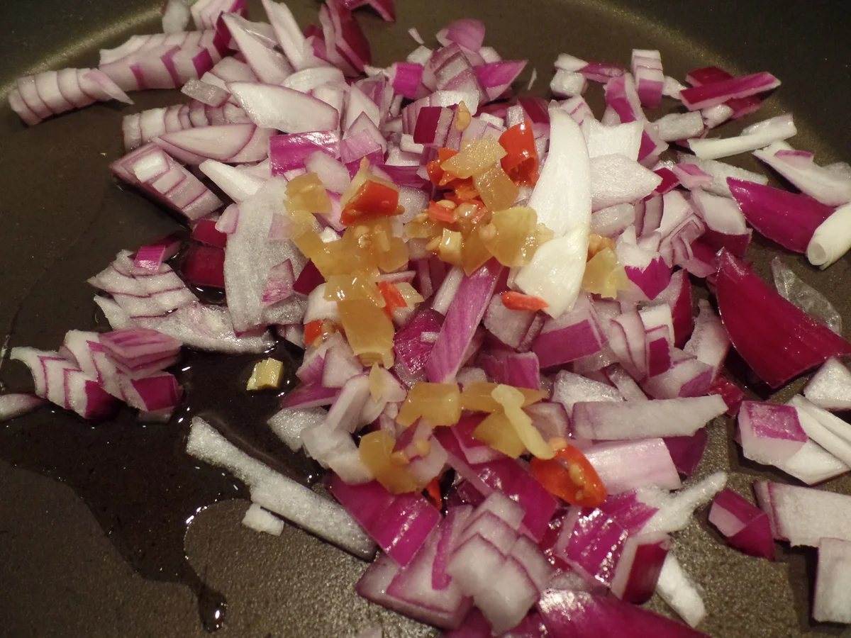 Rezept: Pochierte Eier in Tomatensoße Bild Nr. 2310 Pochierte Eier in Tomatensoße - Rezept - Bild Nr. 2310