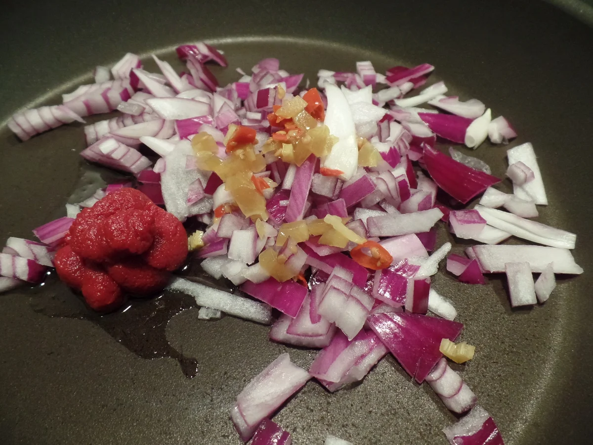 Rezept: Pochierte Eier in Tomatensoße Bild Nr. 2311 Pochierte Eier in Tomatensoße - Rezept - Bild Nr. 2311