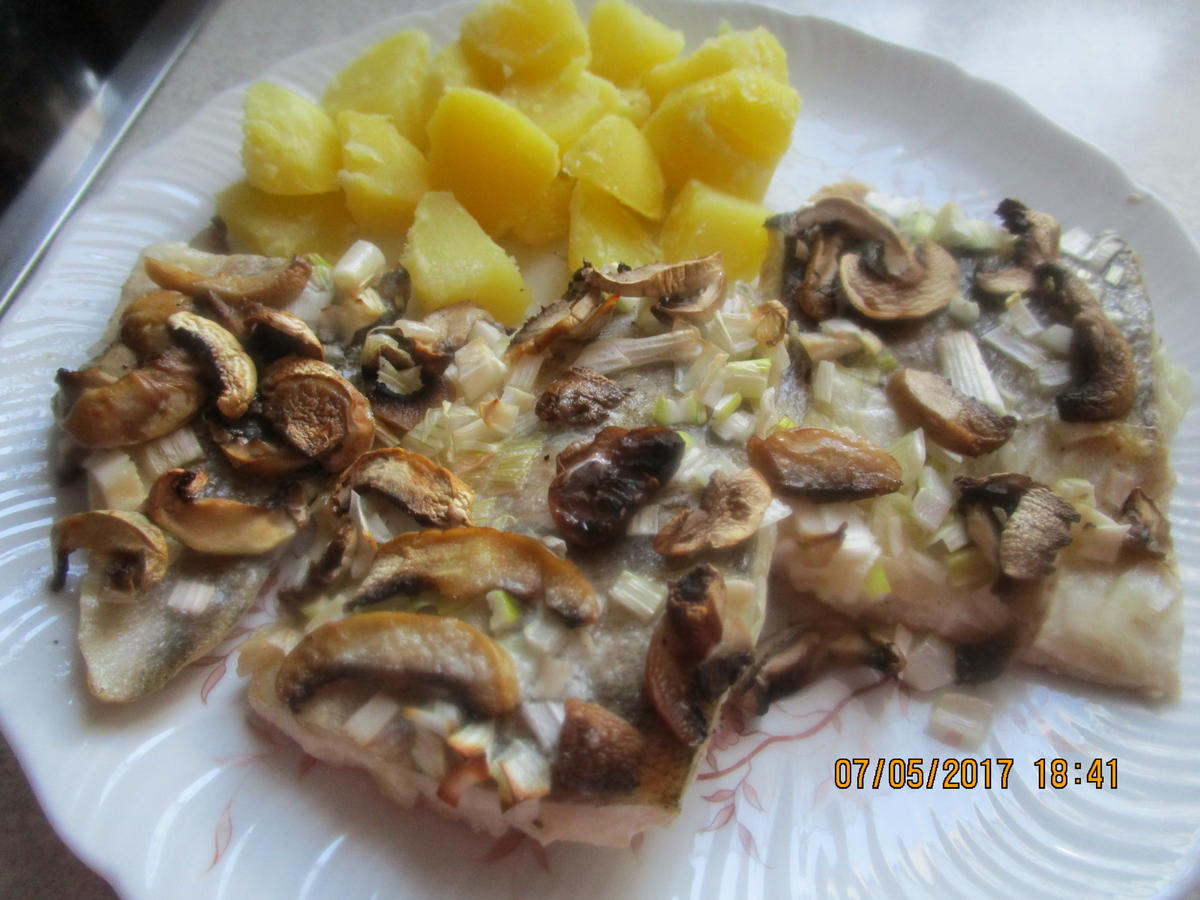 Zanderfilet in Wein-Sahne-Sauce - Rezept - kochbar.de