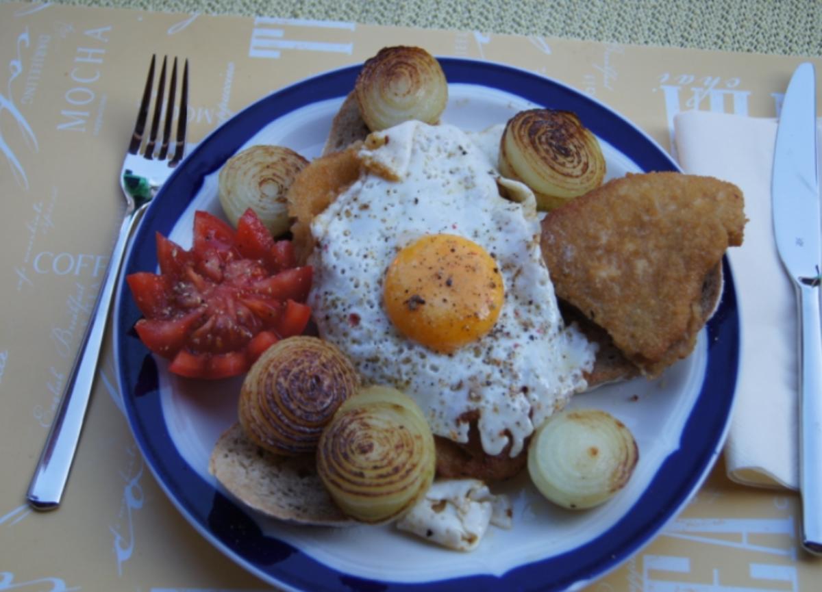 Bilder für Wiener Schnitzel vom Schwein mit Zwiebeln und Spiegelei - Rezept