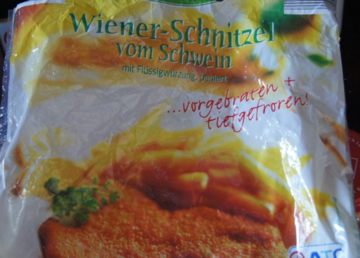 Wiener Schnitzel vom Schwein mit Zwiebeln und Spiegelei - Rezept - Bild Nr. 4