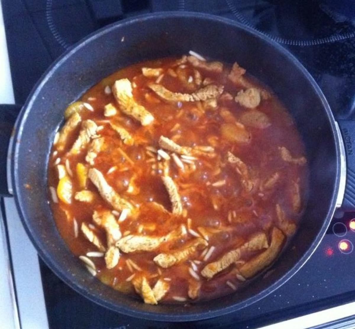 Puten-Mandarinen-Curry mit Mandeln - Rezept - kochbar.de