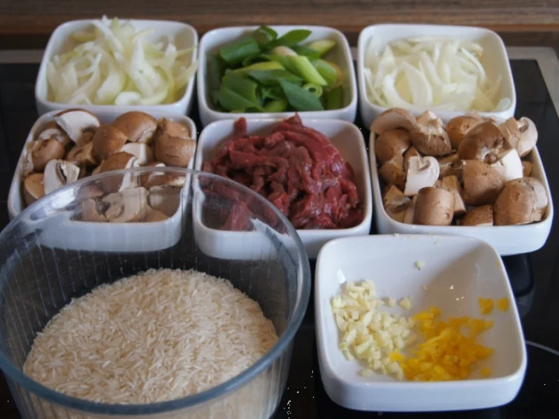 Rezept: Rindfleisch mit Champignons und Zwiebeln in Austersauce mit Basmatireis Bild Nr. 3827 Rindfleisch mit Champignons und Zwiebeln in Austersauce mit Basmatireis - Rezept - Bild Nr. 3827