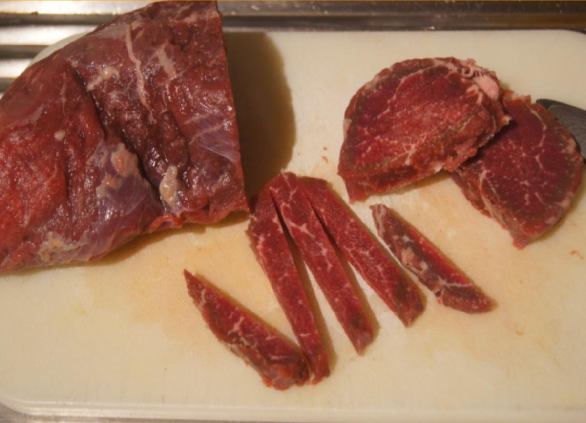 Rindfleisch mit Zwiebeln und Würzreis - Rezept - Bild Nr. 4895