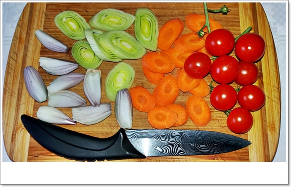 Gebackene Dorade aus dem Ofen, im Gemüsebett - Rezept - Bild Nr. 5358