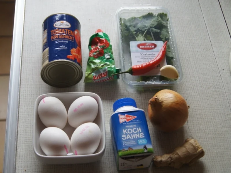 Eiercurry mit Tomaten und Fladenbrot - Rezept - Bild Nr. 5479
