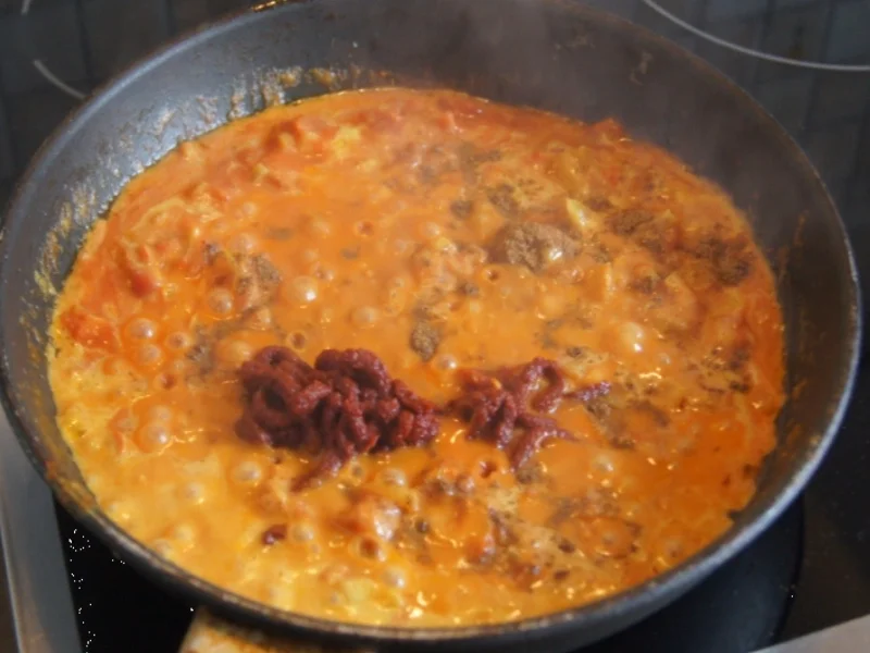 Eiercurry mit Tomaten und Fladenbrot - Rezept - Bild Nr. 5487