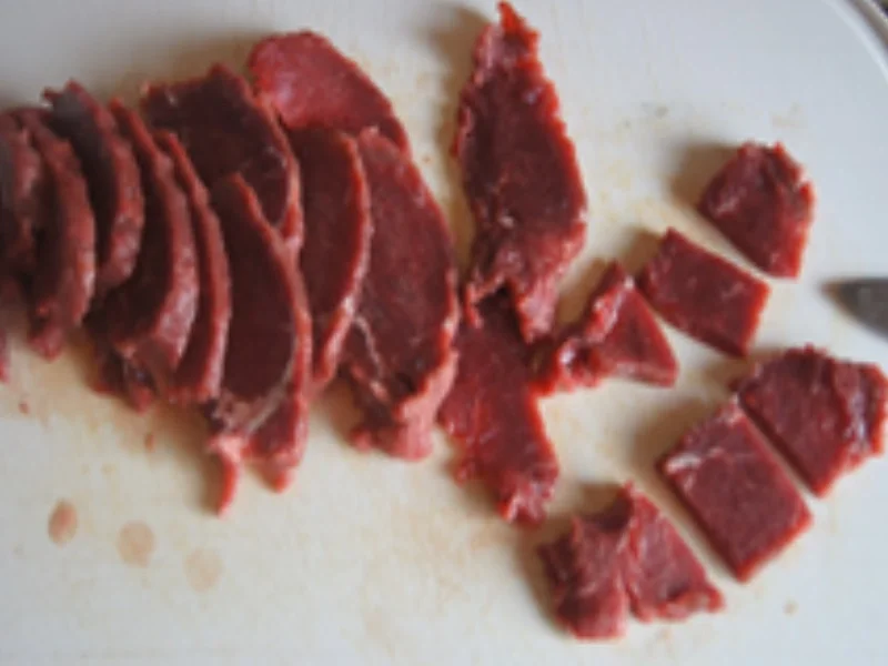 Rindfleisch mit Paprika und gelber Reis mit Erbsen - Rezept - Bild Nr. 5888