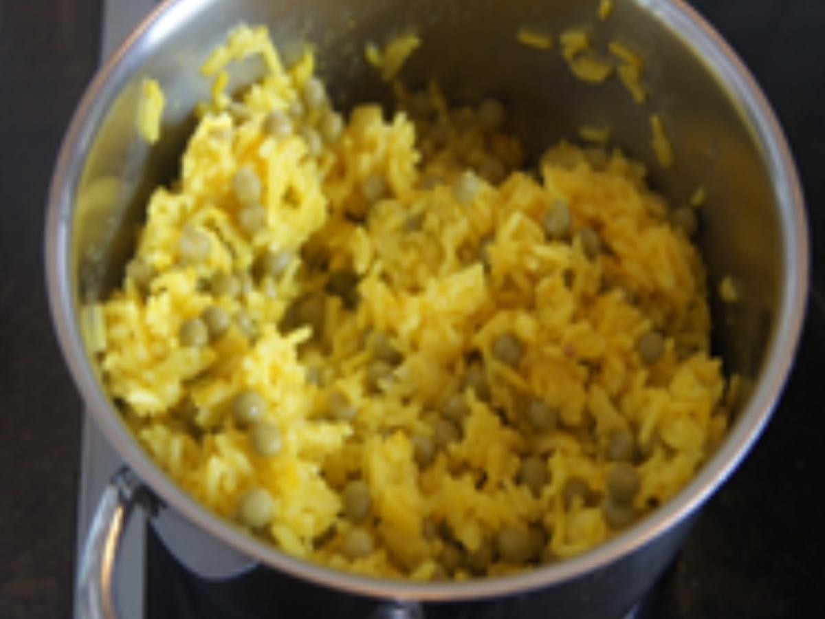 Rindfleisch mit Paprika und gelber Reis mit Erbsen - Rezept - Bild Nr. 5905
