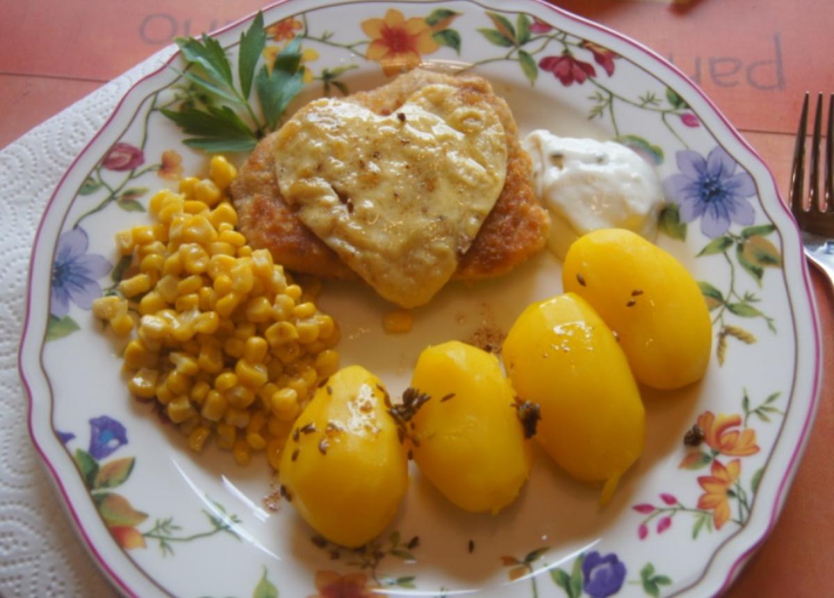 Schweinerückenschnitzel mit Buttermais und gelben Kümmel-Kartoffeln - Rezept - Bild Nr. 6047