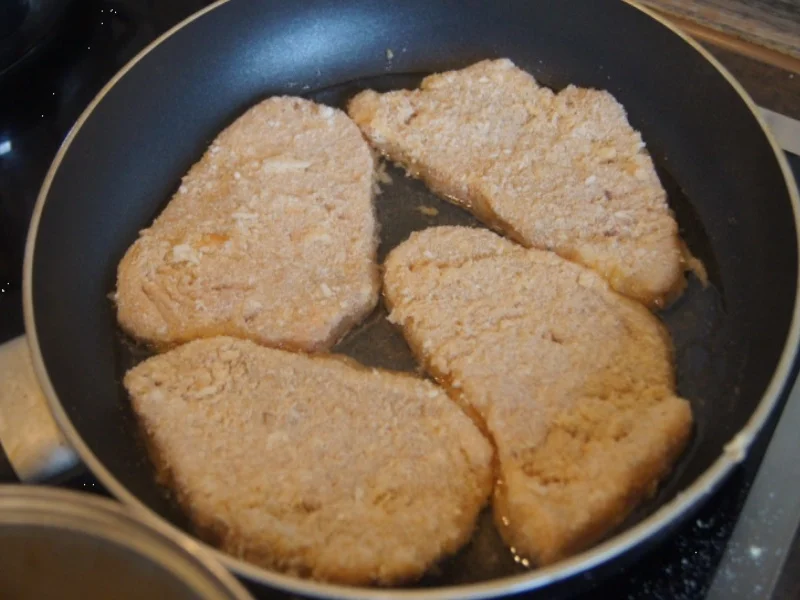 Schweinerückenschnitzel mit Buttermais und gelben Kümmel-Kartoffeln - Rezept - Bild Nr. 6050