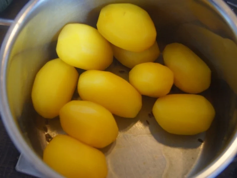 Schweinerückenschnitzel mit Buttermais und gelben Kümmel-Kartoffeln - Rezept - Bild Nr. 6056