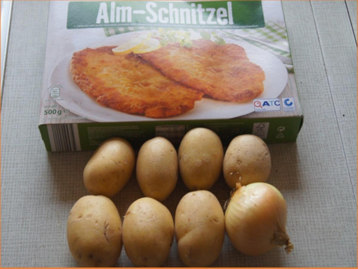 Alm-Schnitzel mit herzhaften Bratkartoffeln - Rezept - Bild Nr. 3