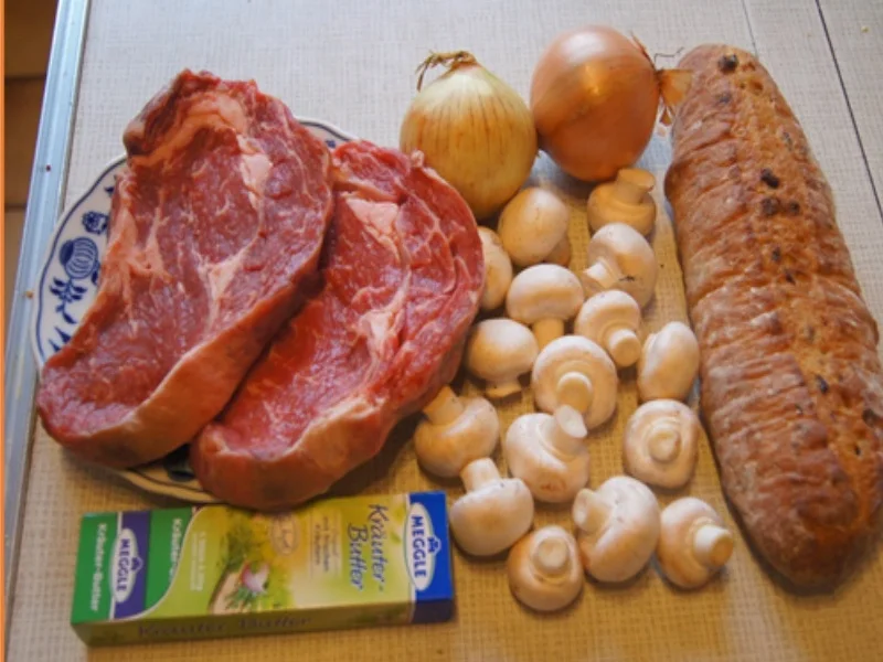 Entrecôte mit Zwiebelringen und Champignons - Rezept - Bild Nr. 7163