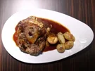 Ossobuco alla milanese an Gemüse und Rosmarinbratlingen - Rezept