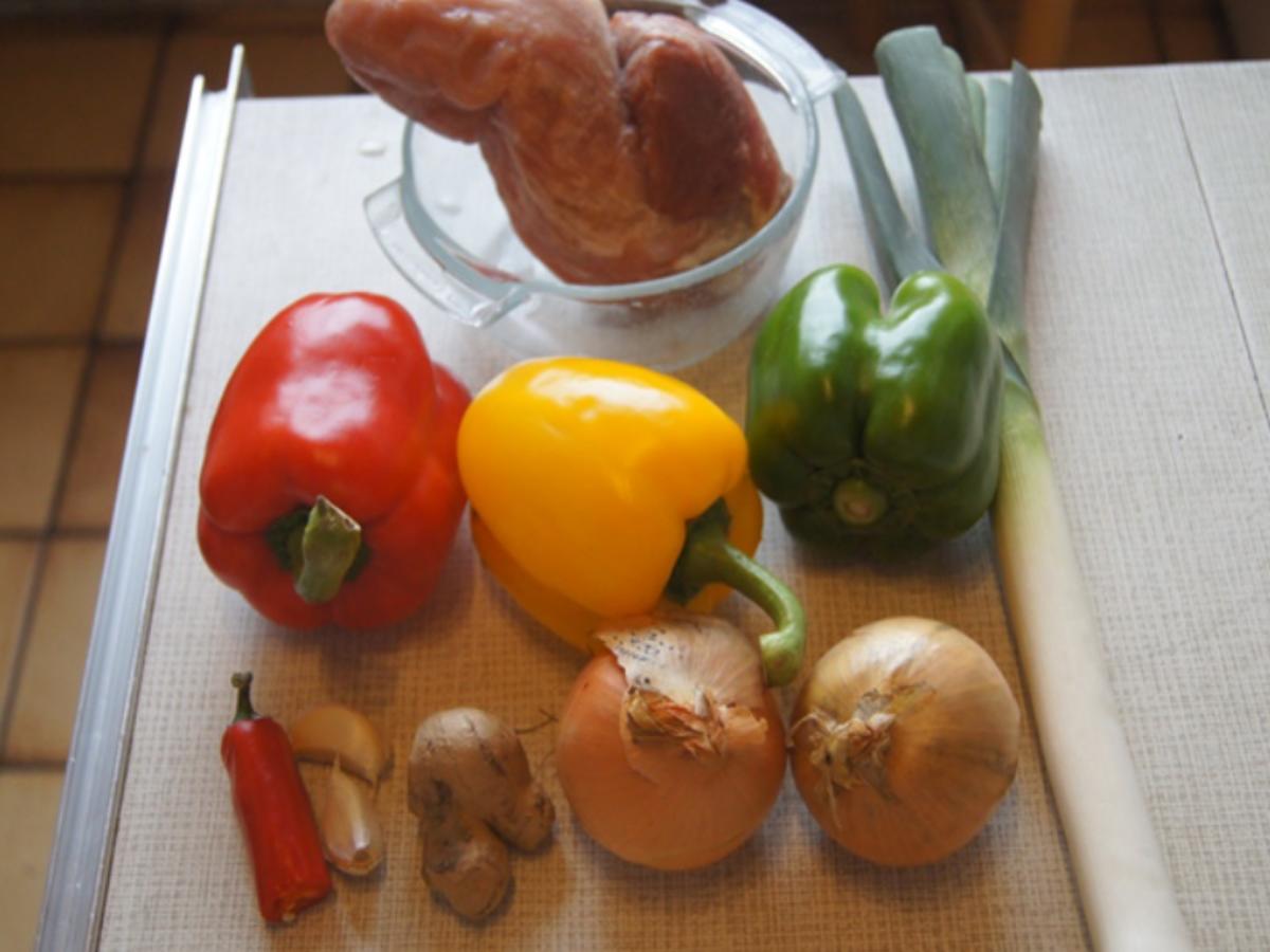 Schweinefilet mit Austernsauce und Gemüse im Wok und gelber Basmatireis - Rezept - Bild Nr. 8142