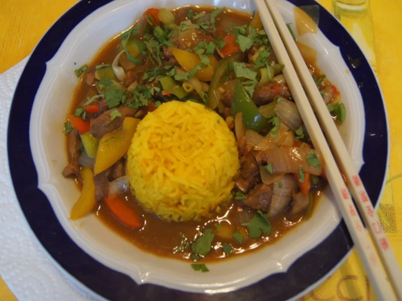 Schweinefilet mit Austernsauce und Gemüse im Wok und gelber Basmatireis - Rezept - Bild Nr. 8142