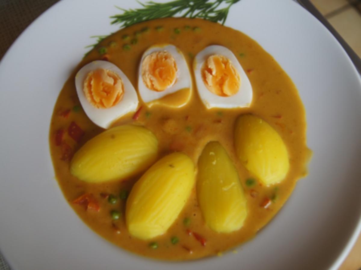 Eier mit Curry-Sauce und Curry-Kartoffeln - Rezept - kochbar.de