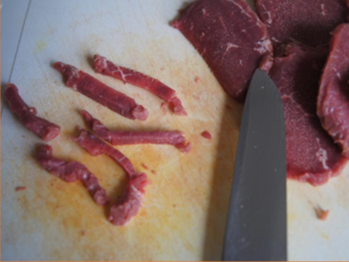 Pfannengerührte Rindfleischstreifen mit Paprika und herzhaften Kartoffelstampf - Rezept - Bild Nr. 8869