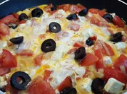 Geschmorte Tomaten mit Zwiebeln, Schafskäse und Ei - Rezept - Bild Nr. 8954