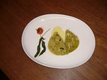 Kräuterravioli gefüllt mit Entenragout - Rezept