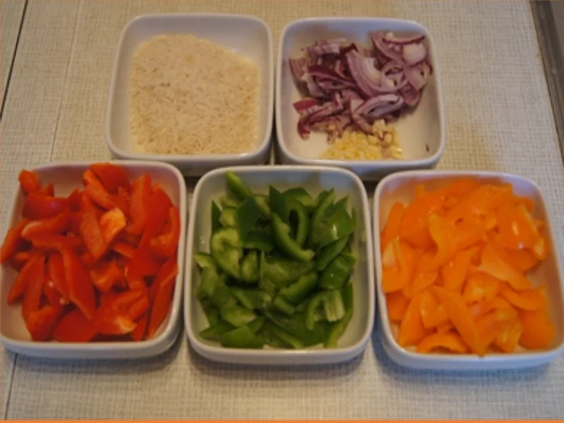 Lachs mit Paprikaschmorgemüse und gelben Basmatireis - Rezept - Bild Nr. 7