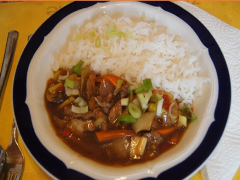 Schweinefilet mit Gemüse im Wok und Basmatireis - Rezept - Bild Nr. 2