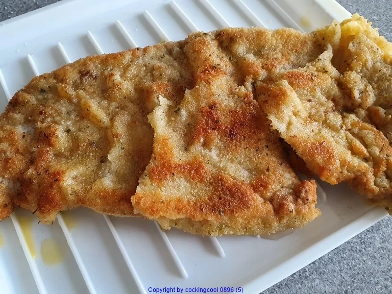 Weihnachtliches Kalbsschnitzel paniert - Rezept - Bild Nr. 6