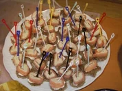 Räucherlachs-Forellen-Rolle auf Pumpernickel - Rezept