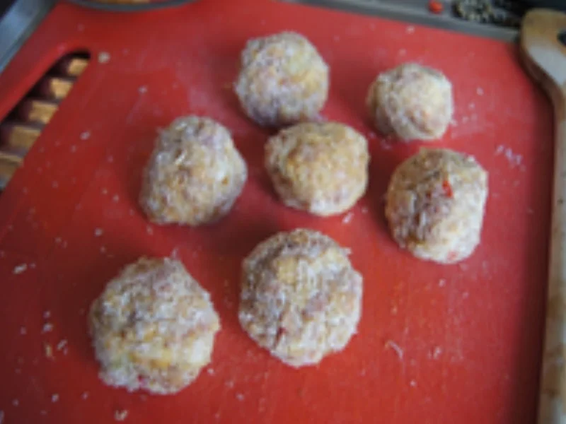 Pikant gewürzte Mettbällchen mit Gemüsemix im Wok und gelber Basmatireis - Rezept - Bild Nr. 7