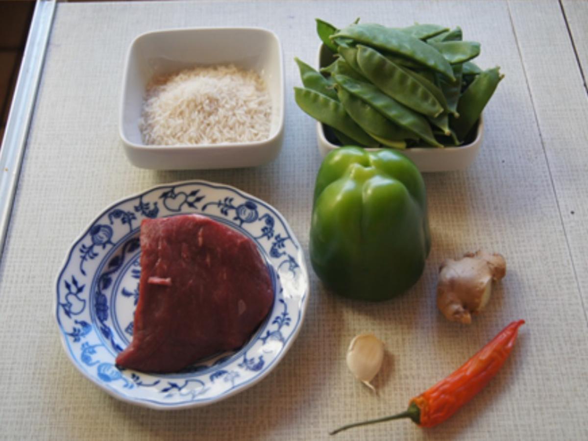 Steakhüfte mit Paprika-Zuckerschoten-Gemüse im Wok und gelber Basmatireis - Rezept - Bild Nr. 3