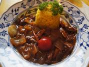 Kalbsleber mit Ingwer und Gemüsezwiebel im Wok mit gelben Basmatireis - Rezept - Bild Nr. 2