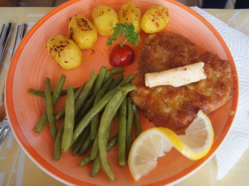 Rezept: Panierte Lummer-Koteletts mit Buschbohnen und Drillingen Bild Nr. 17 Panierte Lummer-Koteletts mit Buschbohnen und Drillingen - Rezept - Bild Nr. 17