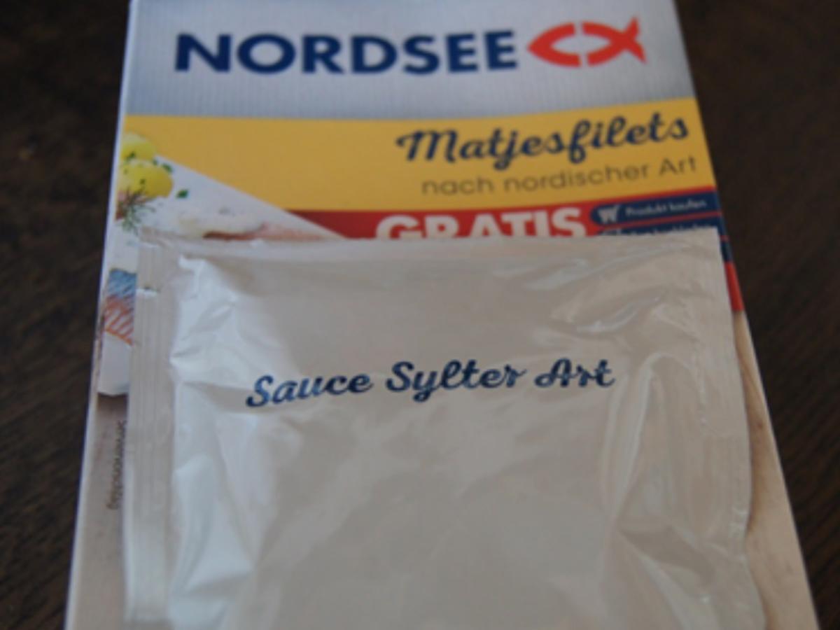 Matjesfilet mit Sauce Sylter Art, Buschbohnen und Pellkartoffeln ...