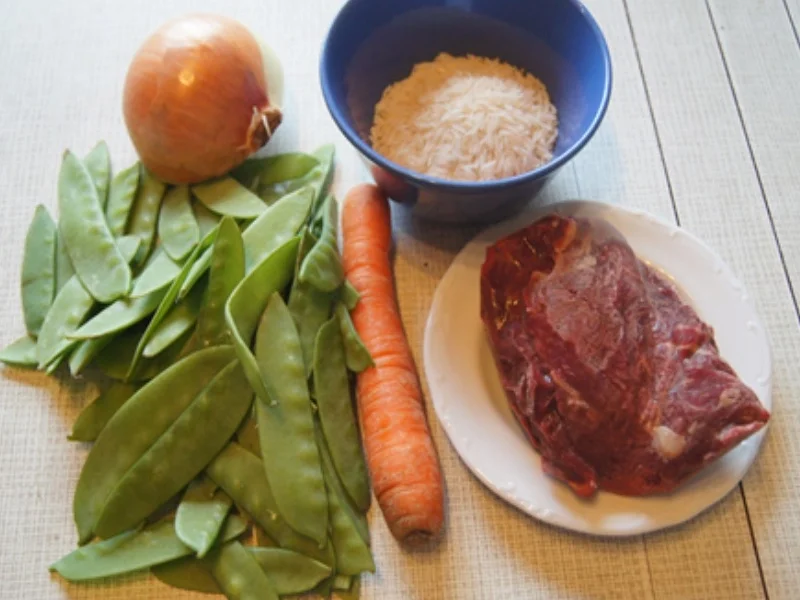 Rindfleisch mit Zuckerschoten im Wok und gelber Basmatireis - Rezept - Bild Nr. 3