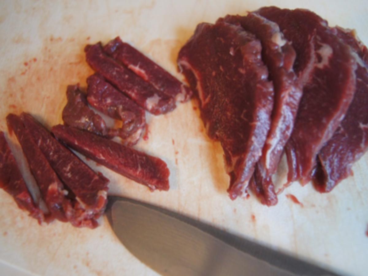 Rindfleisch mit Zuckerschoten im Wok und gelber Basmatireis - Rezept - Bild Nr. 5