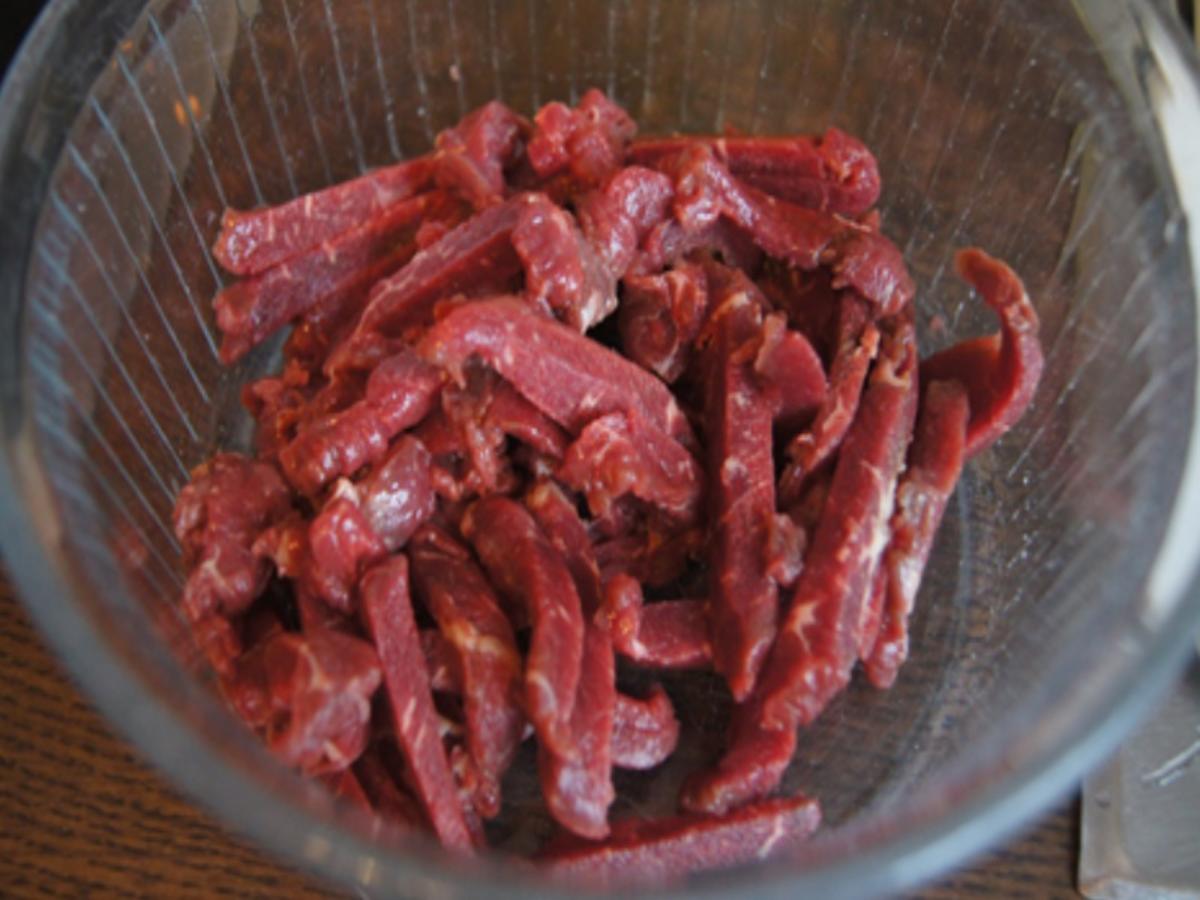 Rindfleisch mit Zuckerschoten im Wok und gelber Basmatireis - Rezept - Bild Nr. 6