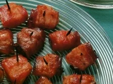 Marinierte Rum-Ananas im Speckmantel - Rezept