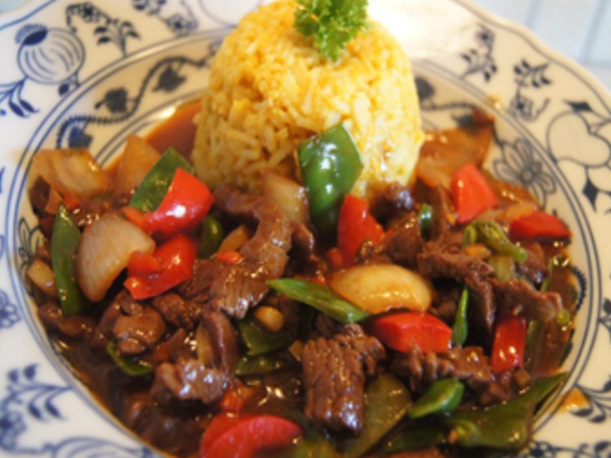 Rindfleisch mit Gemüse aus dem Wok mit Curryreis - Rezept - kochbar.de