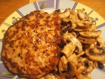 Rezept: geschabtes Schweinesteak mit Rahmchampigions geschabtes Schweinesteak mit Rahmchampigions - Rezept