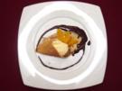 Warmes Orangeneis an Praline-Soße mit Crepes-Läppchen - Rezept