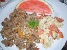 Reisfleisch mit Tomaten-Rührei und Wassermelone ! - Rezept - Bild Nr. 3