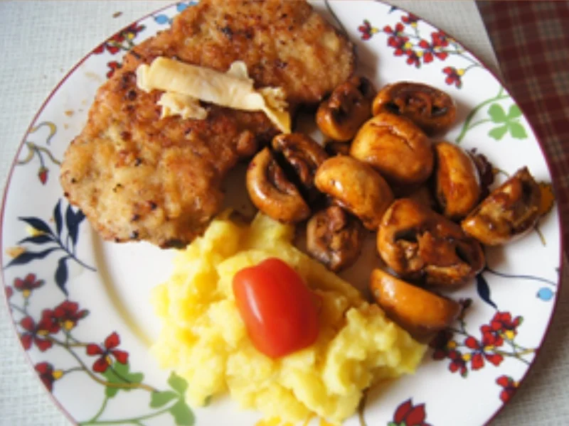Rezept: Schnitzel XXL mit Champignons und Kartoffelstampf Bild Nr. 10894 Schnitzel XXL mit Champignons und Kartoffelstampf - Rezept - Bild Nr. 10894