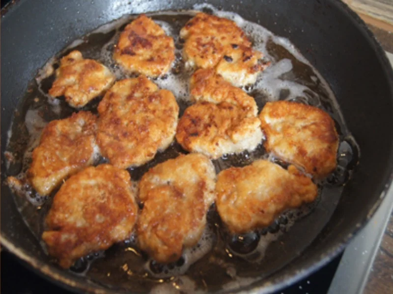 Rezept: Schweinefiletschnitzelchen mit Honig-Möhren-Sticks und Süßkartoffel-Kartoffel-Stampf Bild Nr. 11 Schweinefiletschnitzelchen mit Honig-Möhren-Sticks und Süßkartoffel-Kartoffel-Stampf - Rezept - Bild Nr. 11