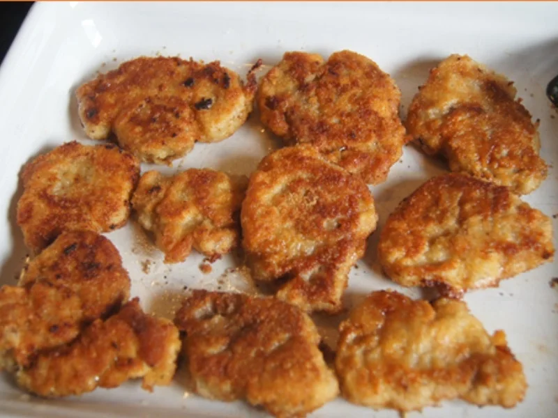 Rezept: Schweinefiletschnitzelchen mit Honig-Möhren-Sticks und Süßkartoffel-Kartoffel-Stampf Bild Nr. 12 Schweinefiletschnitzelchen mit Honig-Möhren-Sticks und Süßkartoffel-Kartoffel-Stampf - Rezept - Bild Nr. 12