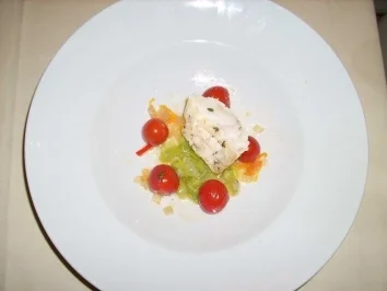 Rezept: Seeteufel an feurigen Tomaten und karamellisiertem Lauch Seeteufel an feurigen Tomaten und karamellisiertem Lauch - Rezept